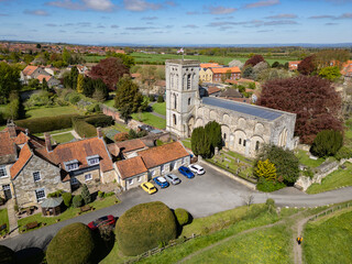 Aerial view of St Mary's Priory in Old Malton in North Yorkshire - United Kingdom. The medieval St Mary's Priory Church in the village of Old Malton near the market town of Malton, North Yorkshire in  © mrallen