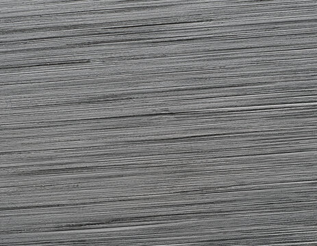 Makro-Aufnahme einer grau geb&uuml;rsteten Oberfl&auml;che mit feiner Linien-Textur