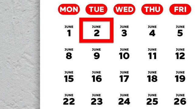 The date June 2nd marked with a red cursor on the wall calendar 2026