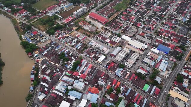 Aerial drone view of Nibong Tebal town riverfront and rooftops