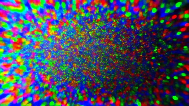 Tracking zoom of colorful confetti particles drifting toward camera in macro abstract light field with bokeh and chromatic separation