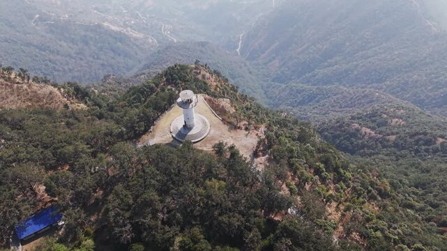 Footage of Resunga Tower with panoramic hillside views, forest cover, and scenic environment in Gulmi, Nepal.