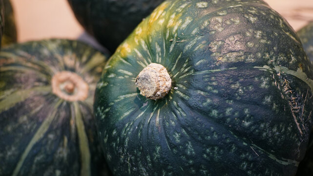 Stacked Pumpkins at a Greengrocer