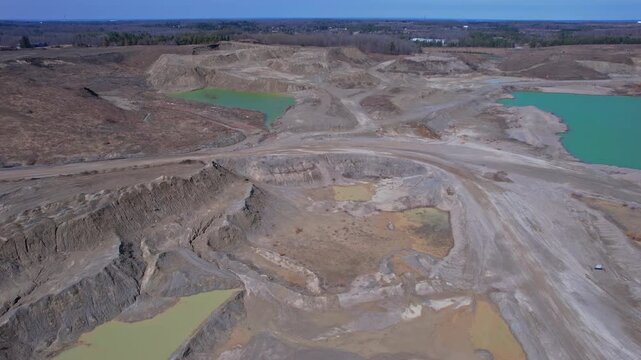 Terrestrial Canadian landscape of rare earth mining site. Critical rare earth minerals excavate for Artificial intelligence AI technology, weapons and electric vehicles. Deep underground Industry.