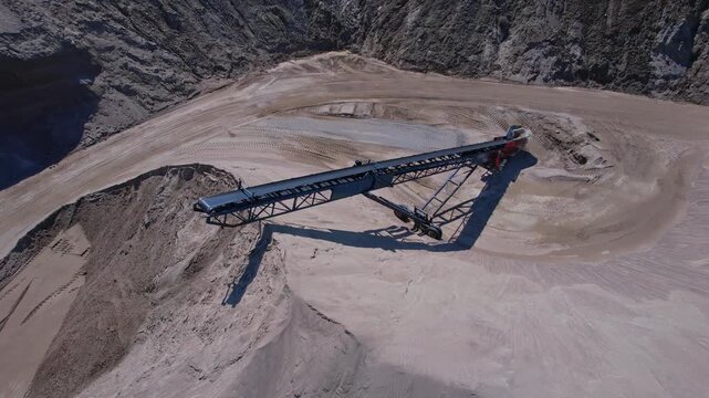 Aerial view of mining sector field. Concept of rapid expanding global market for semiconductors, and supply chains for AI systems and data centres. Rear earth development demand by memory chip makers.