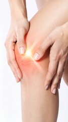Fototapeta premium Close-up of hands holding painful knee with glowing red highlight and transparent joint overlay, medical pain concept on white background