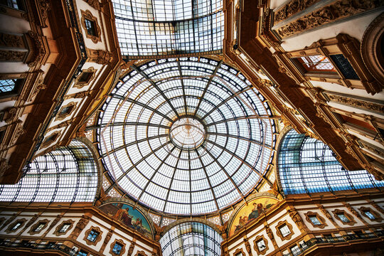 iconic glass and iron dome architecture of the Galleria Vittorio Emanuele II, a famous landmark constructed between 1865 and 1877 in Milan, Italy, Europe 