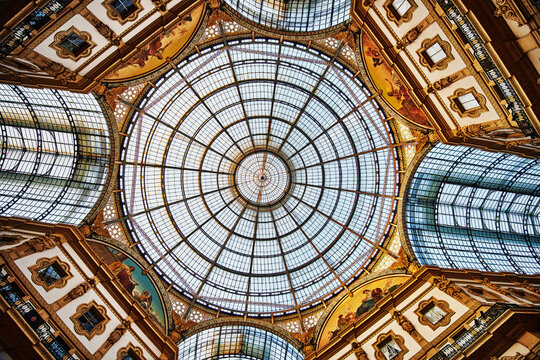 iconic glass and iron dome architecture of the Galleria Vittorio Emanuele II, a famous landmark constructed between 1865 and 1877 in Milan, Italy, Europe 