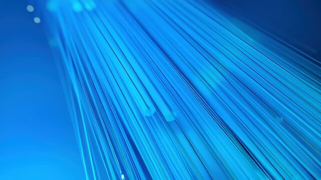 Blue Fiber Optic Infrastructure Light Trails on Abstract Background, Glowing Bokeh Technology