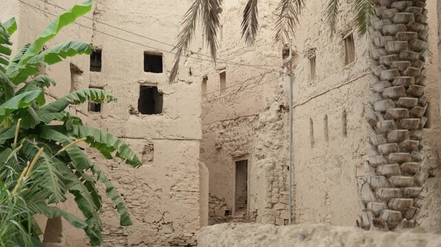 Slow Motion Birkat Al Mouz Ruins, Cinematic Abandoned Mud-Brick Village and Hajar Mountains in Oman