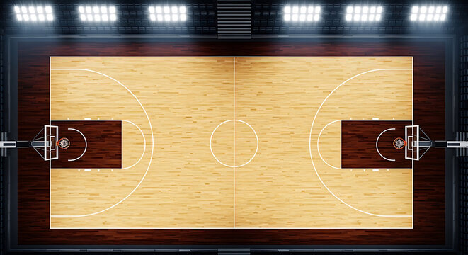 Overhead view of a brightly lit indoor basketball court with wooden floor and white markings, ready for a game.