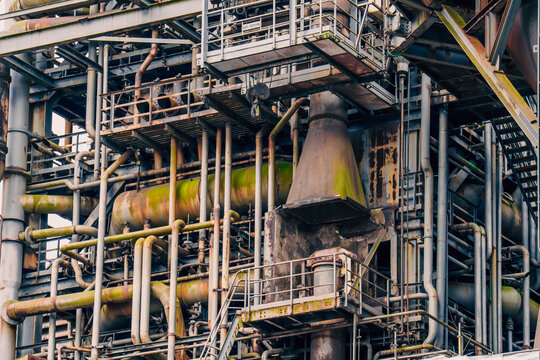 Industrial factory complex steel pipes wallpaper background