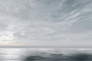 Fototapeta premium Tranquil seascape with vast sky and serene horizon at dusk