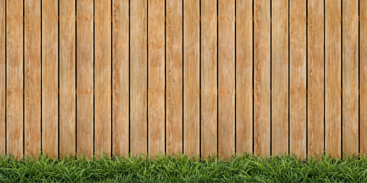 Vintage brown wooden plank fence with a rough timber texture and natural green grass creates a weathered backdrop pattern for this old hardwood surface material
