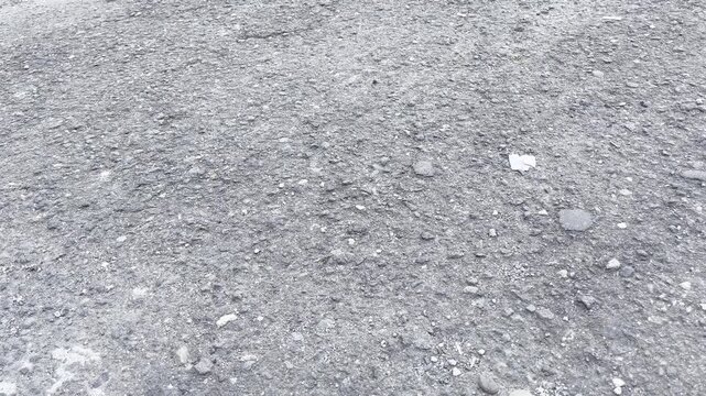 Rough Grey Asphalt Texture with Gritty Sand Surface