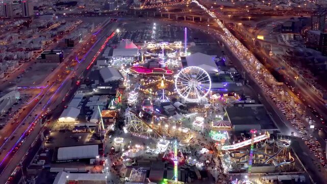 Panoramic Drone View of Riyadh City Skyline Featuring Kingdom Centre and Urban Traffic