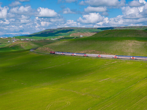 South Kurtalan Express (G&uuml;ney Kurtalan Ekspresi) in the Spring Season Drone Photo, Ankara to Siirt Express, Batman Turkiye (Turkey) 