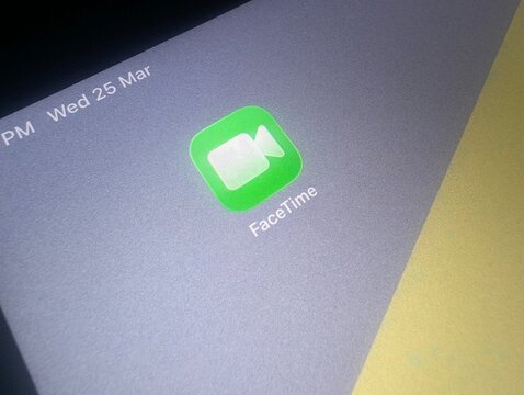Apple FaceTime application icon displayed on tablet screen close up
