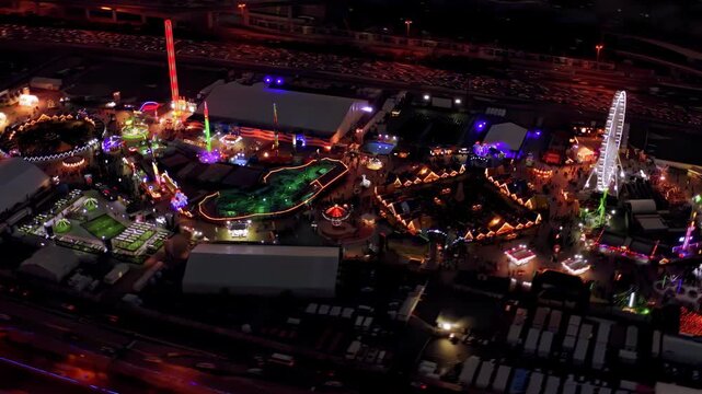 Panoramic Drone View of Riyadh City Skyline Featuring Kingdom Centre and Urban Traffic