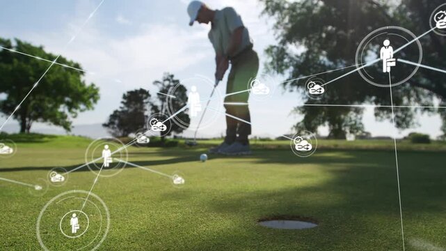 Mature male golfer pausing before starting putt, aiming to sink ball in cup, analytics web framing