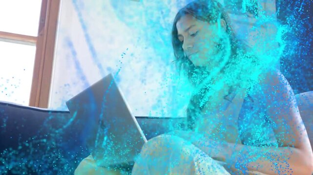 Female teenager studying on sofa for education, blue wave flowing over laptop and causing scanning
