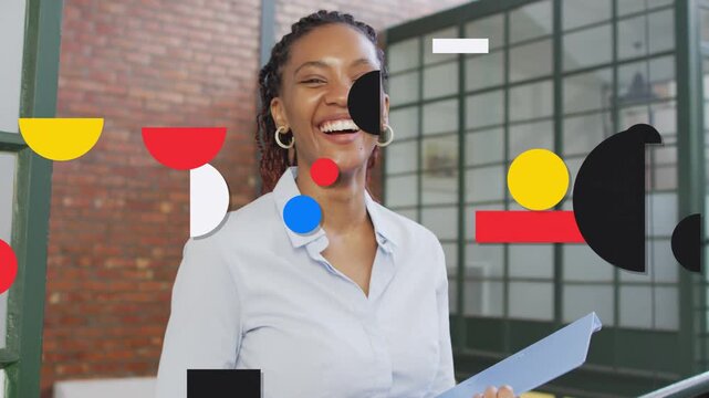 Woman holding blue folder laughing while shapes entering frame stacking and covering her for design