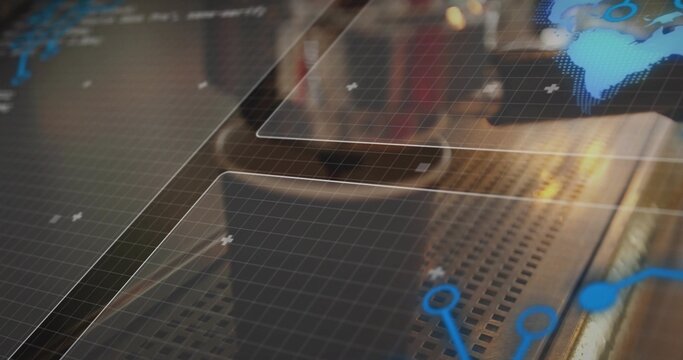 Displaying transparent panels over perforated metal console, showing blue node icons over faint map