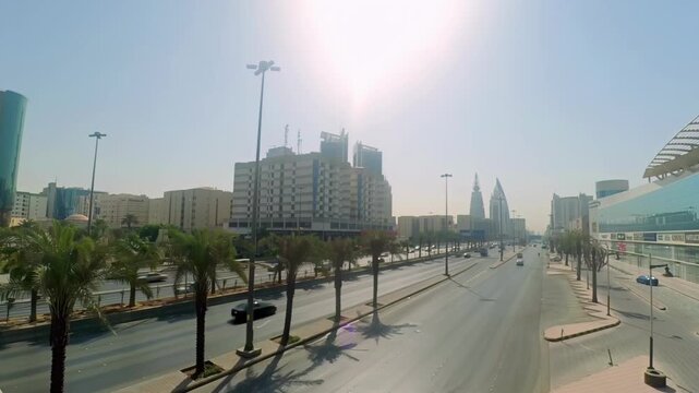 Riyadh City Skyline Aerial View Featuring Kingdom Tower and Heavy Traffic Flow on King Fahd Road, Saudi Arabia.