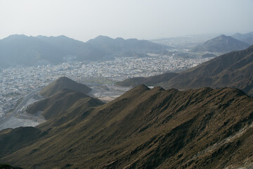 Fototapeta premium view of Ras Al Khaimah city from Hajar mountains top at twilight