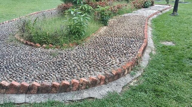 Reflexology Stone walkway in the garden, stone path in the public garden in kluang , johor ,malaysia.