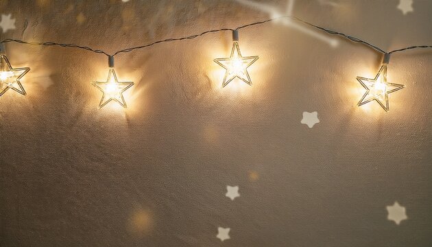 shining string lights with starburst glow against a creamcolored wall backdrop