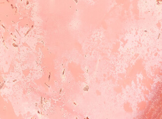Fototapeta premium Close-up of oxidized metal surface with soft pink rust patterns. Ideal for texture backgrounds, industrial themes, and vintage design.