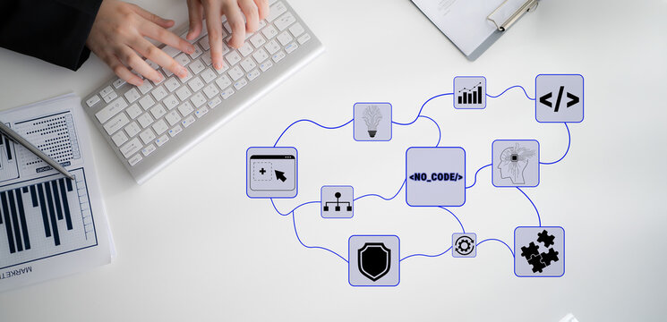 Hands Typing on Keyboard with Flowchart Elements for No-Code Solutions in a Modern Workspace Environment Featuring Data Visualization and Technology Icons Quark.
