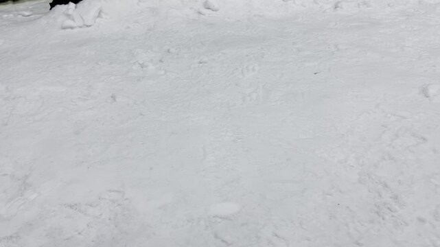 Natural White Snow Texture with Footprints Background