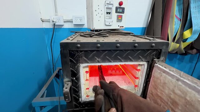 Heat treatment and quenching process of a Damascus steel knife.