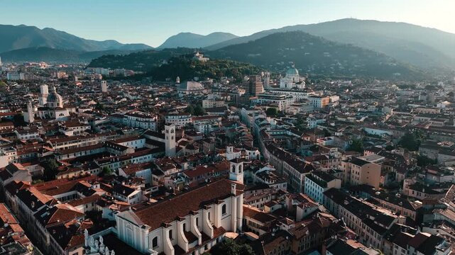 Aerial view of Brescia Italy - old world architecture mixed with modern city living on a summer day