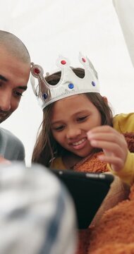 Father, child and relax with tablet at house for homework, academic video and role play. Smile, man or daughter with digital for online education, learning support and princess character for dress up