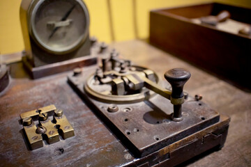 Vintage morse code telegraph machine communicating information © Cesar Gallardo