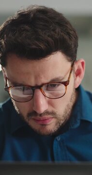 Laptop, glasses or businessman reading in company for insurance claims, planning or risk assessment. Computer, review and broker in office for coverage policy, research and check email for premium