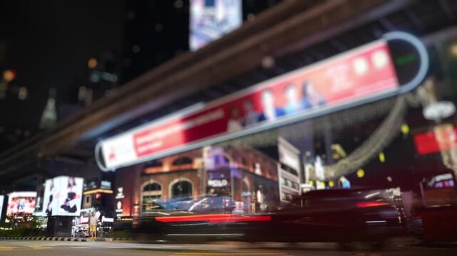 Nightlife and traffic light trails in kuala lumpur intersection
