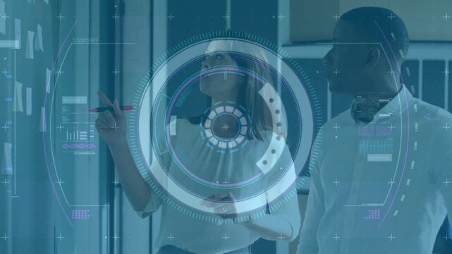 Vertical video: Woman writing on glass with pink marker, man nodding; HUD guiding business planning
