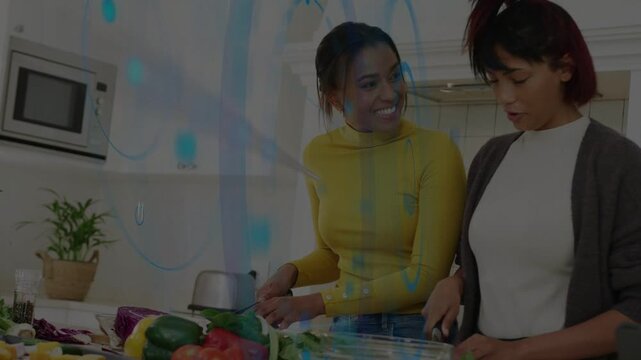 Seeing veg laid out mother and daughter chopping cooking while blue circle growing overlaying