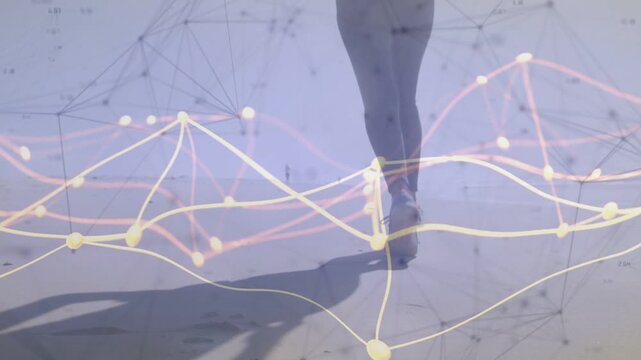 Mid-adult female stepping into jogging on sand while nodes syncing with feet, showing fitness