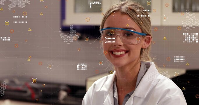 Smiling lab scientist wearing goggles and white lab coat, scanning AR overlays at lab, copy space