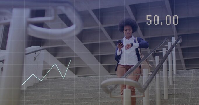 Descending woman in navy blazer checking wristwatch while holding phone on steps, tote, copy space