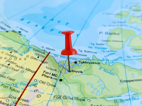 View of Inuvik, is the only town in the Inuvik Region, and the third largest community in Canada's Northwest Territories. on a geographical map of America, marked with red push pin