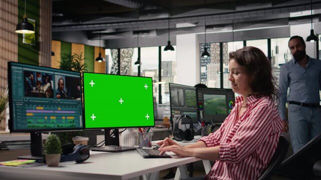 Isolated mockup and editing footage with videographer on PC in agency office, software interface reveals visual effects tools for montage and recorded clips. Color grading controls, film industry.
