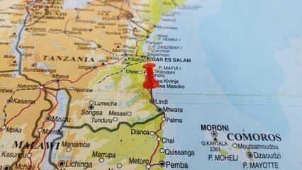 Obraz premium View of Lindi, is a historic coastal town in southern Tanzania, on a geographical map of Africa, marked with red push pin
