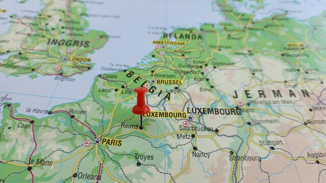 View of Reims, City in Marne, France, on a geographical map of Europe, marked with red push pin
