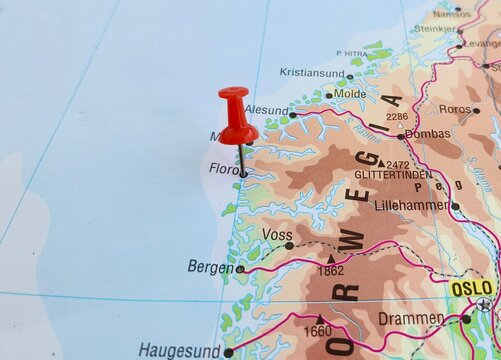 View of Floro, is a town and the administrative centre of Kinn Municipality in Vestland county, Norway, on a geographical map of Europa, marked with red push pin